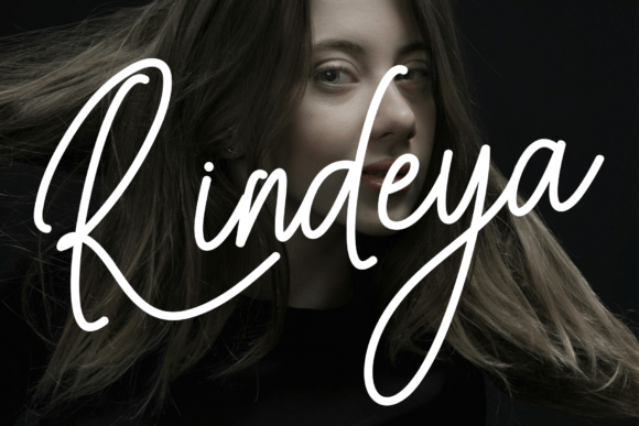 Discover the Beauty of Rindeya: A Handwritten Script Font for Creative Projects